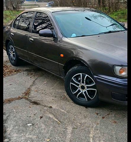 Серый Ниссан Максима, объемом двигателя 3 л и пробегом 250 тыс. км за 2500 $, фото 1 на Automoto.ua