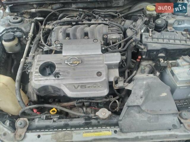 Серый Ниссан Максима, объемом двигателя 2 л и пробегом 858 тыс. км за 1700 $, фото 1 на Automoto.ua