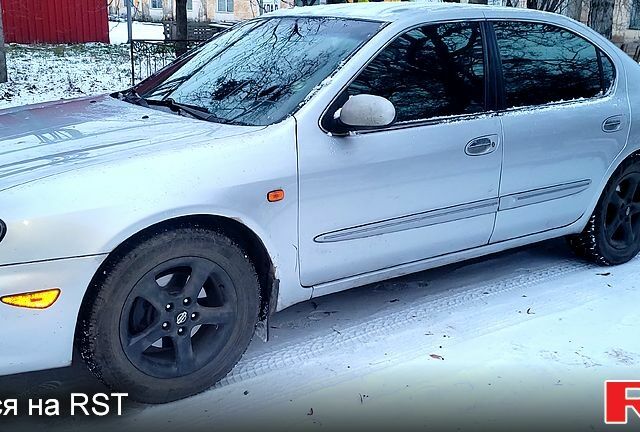 Серый Ниссан Максима, объемом двигателя 2 л и пробегом 470 тыс. км за 3500 $, фото 1 на Automoto.ua