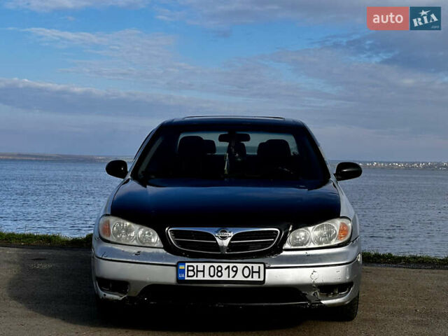 Серый Ниссан Максима, объемом двигателя 3 л и пробегом 390 тыс. км за 2000 $, фото 1 на Automoto.ua