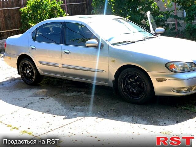 Сірий Ніссан Максіма, об'ємом двигуна 3 л та пробігом 380 тис. км за 2000 $, фото 1 на Automoto.ua