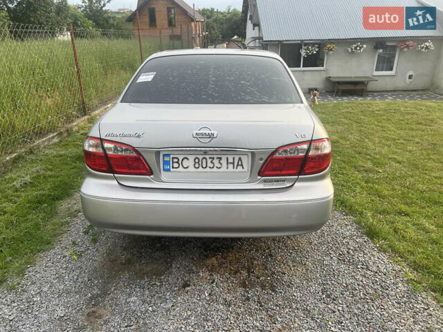 Серый Ниссан Максима, объемом двигателя 2 л и пробегом 400 тыс. км за 2500 $, фото 1 на Automoto.ua