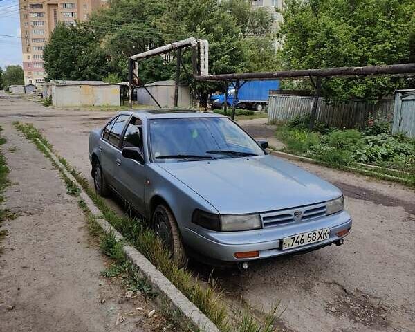 Синий Ниссан Максима, объемом двигателя 3 л и пробегом 302 тыс. км за 1200 $, фото 1 на Automoto.ua