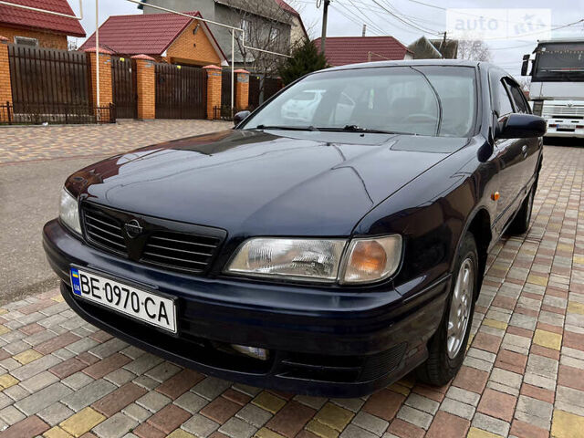 Синий Ниссан Максима, объемом двигателя 2 л и пробегом 321 тыс. км за 2800 $, фото 1 на Automoto.ua