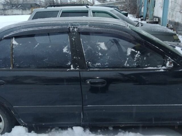 Синий Ниссан Максима, объемом двигателя 2 л и пробегом 400 тыс. км за 1500 $, фото 1 на Automoto.ua