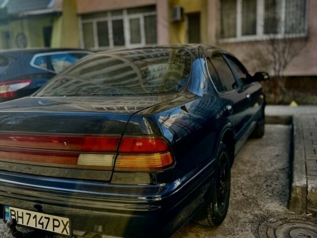 Синий Ниссан Максима, объемом двигателя 2 л и пробегом 300 тыс. км за 2500 $, фото 1 на Automoto.ua
