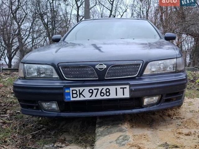 Синий Ниссан Максима, объемом двигателя 2.99 л и пробегом 500 тыс. км за 1300 $, фото 1 на Automoto.ua