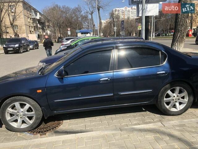 Синий Ниссан Максима, объемом двигателя 2 л и пробегом 235 тыс. км за 3900 $, фото 1 на Automoto.ua