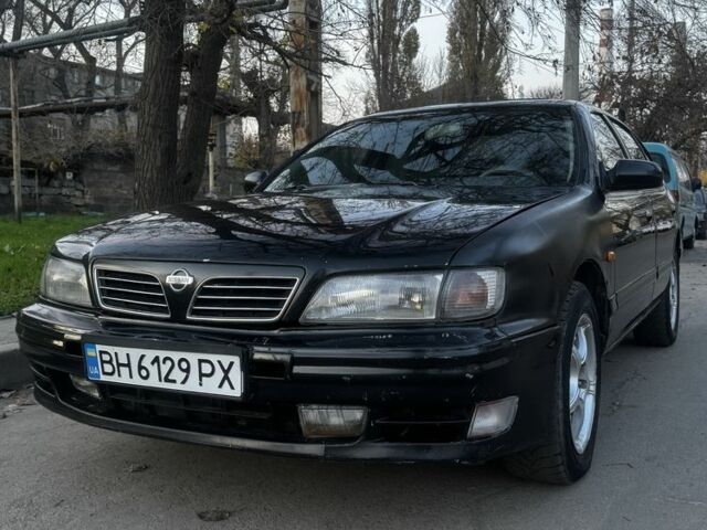 Зеленый Ниссан Максима, объемом двигателя 2 л и пробегом 224 тыс. км за 1950 $, фото 1 на Automoto.ua