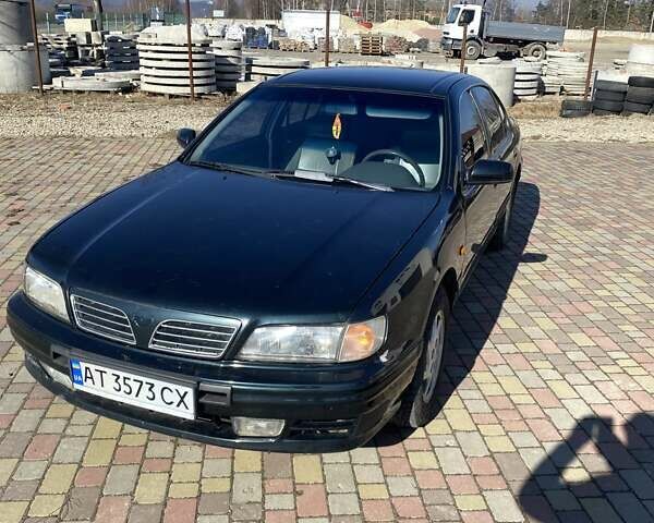 Зеленый Ниссан Максима, объемом двигателя 2 л и пробегом 300 тыс. км за 2700 $, фото 1 на Automoto.ua