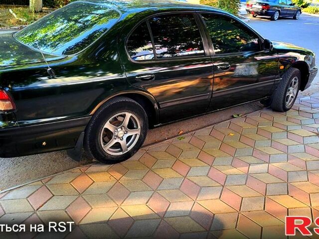 Зеленый Ниссан Максима, объемом двигателя 2 л и пробегом 400 тыс. км за 2900 $, фото 1 на Automoto.ua