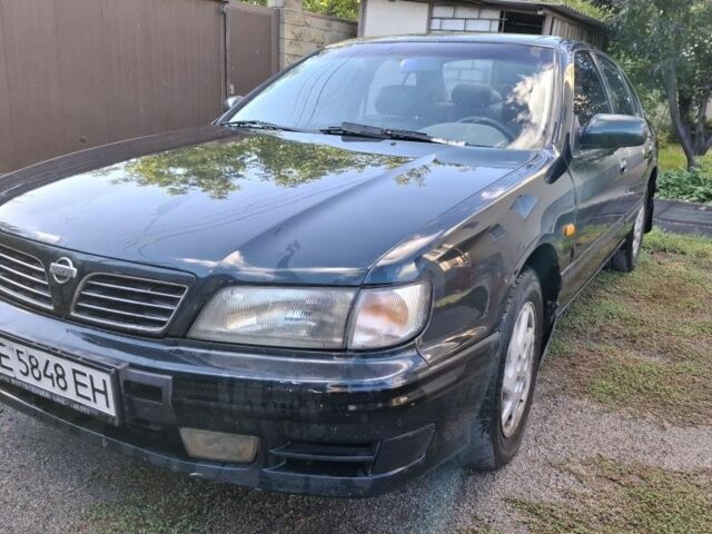 Зелений Ніссан Максіма, об'ємом двигуна 2 л та пробігом 290 тис. км за 1024 $, фото 1 на Automoto.ua