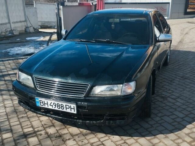 Зеленый Ниссан Максима, объемом двигателя 3 л и пробегом 350 тыс. км за 1600 $, фото 1 на Automoto.ua