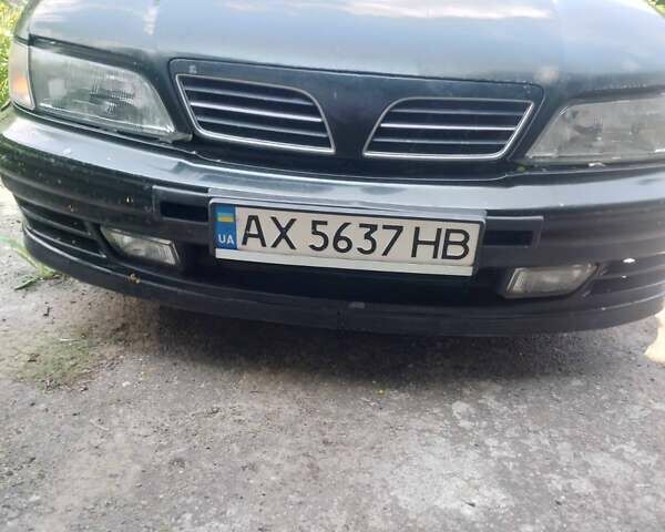 Зелений Ніссан Максіма, об'ємом двигуна 2.99 л та пробігом 381 тис. км за 2100 $, фото 1 на Automoto.ua