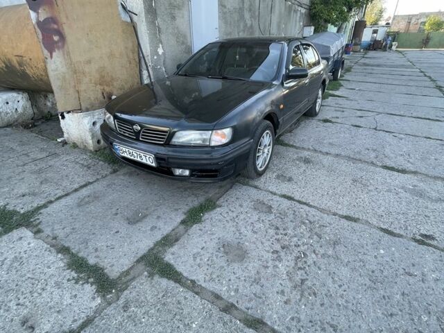 Зеленый Ниссан Максима, объемом двигателя 3 л и пробегом 400 тыс. км за 2000 $, фото 1 на Automoto.ua