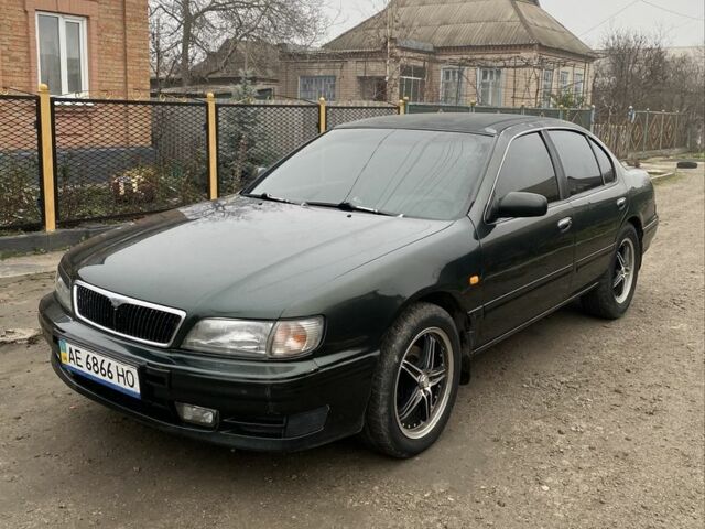 Зеленый Ниссан Максима, объемом двигателя 3 л и пробегом 220 тыс. км за 2700 $, фото 1 на Automoto.ua