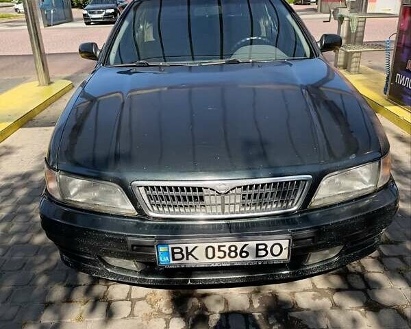 Зелений Ніссан Максіма, об'ємом двигуна 2.99 л та пробігом 435 тис. км за 2999 $, фото 1 на Automoto.ua