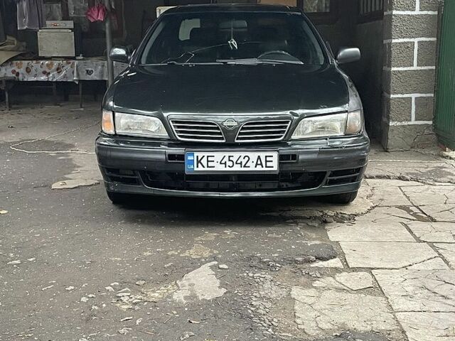 Зеленый Ниссан Максима, объемом двигателя 2 л и пробегом 300 тыс. км за 2100 $, фото 1 на Automoto.ua