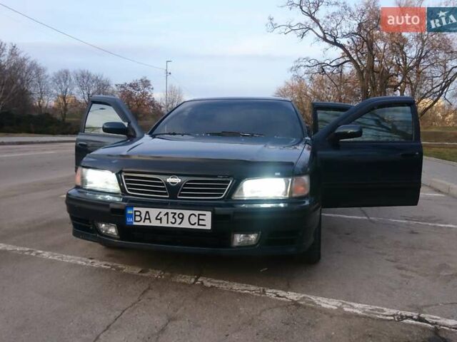 Зелений Ніссан Максіма, об'ємом двигуна 2 л та пробігом 390 тис. км за 3400 $, фото 1 на Automoto.ua