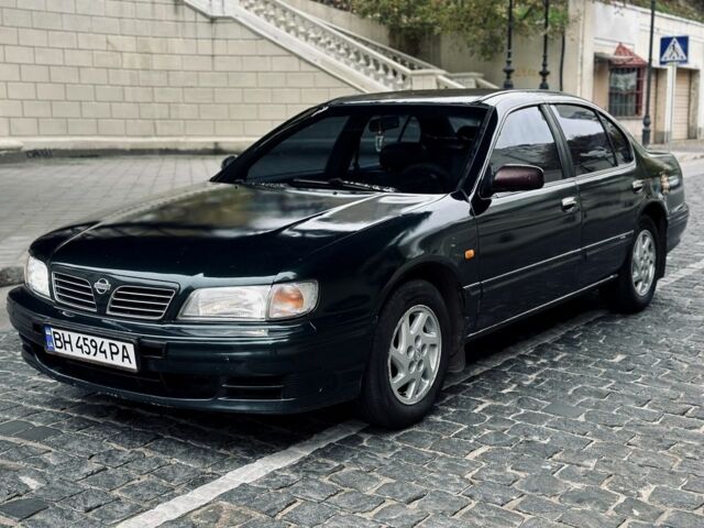Зеленый Ниссан Максима, объемом двигателя 3 л и пробегом 250 тыс. км за 2200 $, фото 1 на Automoto.ua