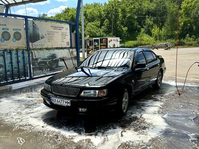 Зеленый Ниссан Максима, объемом двигателя 3 л и пробегом 350 тыс. км за 4500 $, фото 1 на Automoto.ua