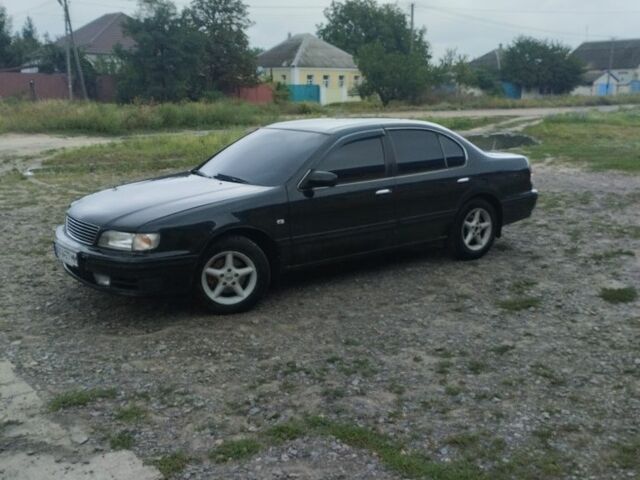 Зеленый Ниссан Максима, объемом двигателя 3 л и пробегом 300 тыс. км за 2600 $, фото 1 на Automoto.ua