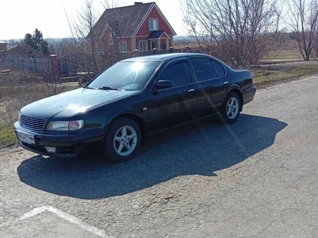 Зеленый Ниссан Максима, объемом двигателя 3 л и пробегом 360 тыс. км за 2200 $, фото 1 на Automoto.ua