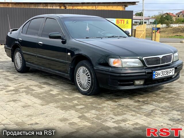 Зелений Ніссан Максіма, об'ємом двигуна 3 л та пробігом 453 тис. км за 2100 $, фото 1 на Automoto.ua