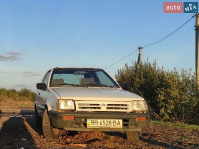 Белый Ниссан Микра, объемом двигателя 1.28 л и пробегом 251 тыс. км за 1300 $, фото 1 на Automoto.ua