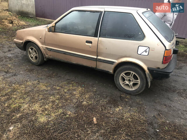 Бежевий Ніссан Мікра, об'ємом двигуна 1 л та пробігом 195 тис. км за 999 $, фото 1 на Automoto.ua