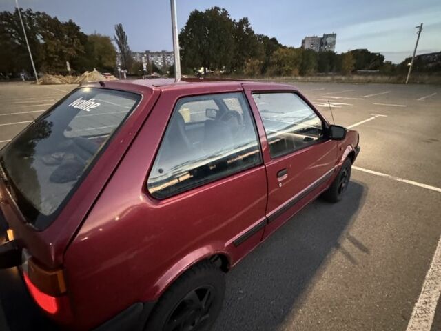 Червоний Ніссан Мікра, об'ємом двигуна 1 л та пробігом 455 тис. км за 950 $, фото 1 на Automoto.ua