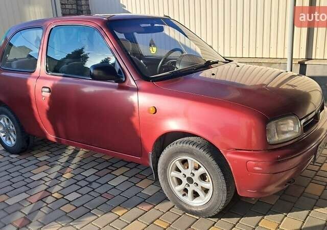 Красный Ниссан Микра, объемом двигателя 1 л и пробегом 300 тыс. км за 1700 $, фото 1 на Automoto.ua