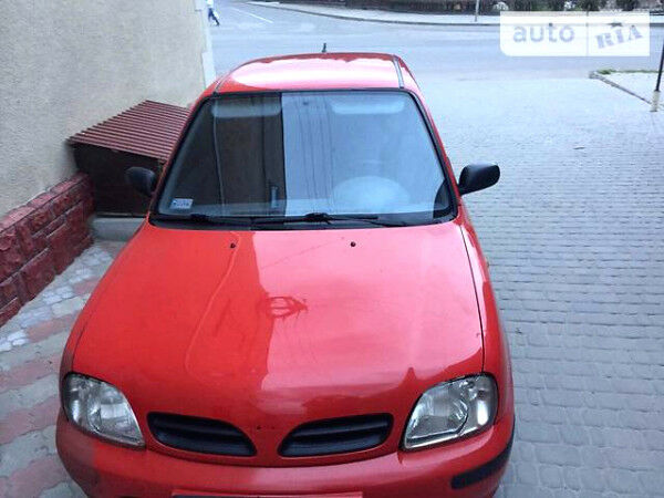 Красный Ниссан Микра, объемом двигателя 1 л и пробегом 122 тыс. км за 1099 $, фото 1 на Automoto.ua