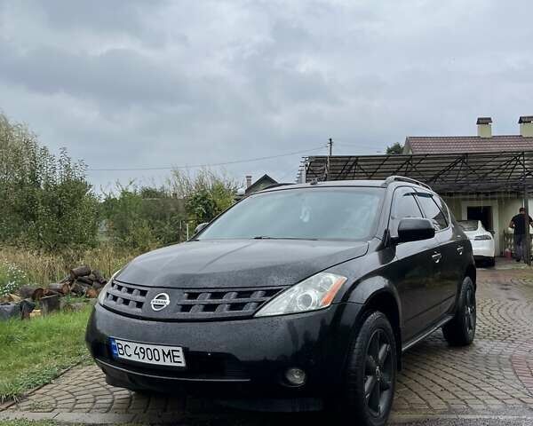 Черный Ниссан Мурано, объемом двигателя 3.5 л и пробегом 208 тыс. км за 4600 $, фото 1 на Automoto.ua