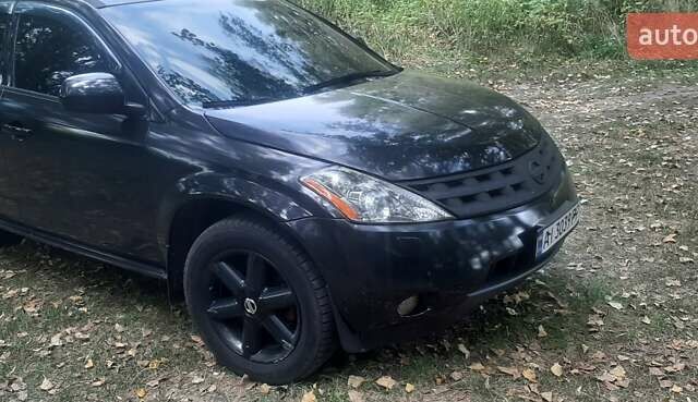 Черный Ниссан Мурано, объемом двигателя 3.5 л и пробегом 250 тыс. км за 5600 $, фото 1 на Automoto.ua