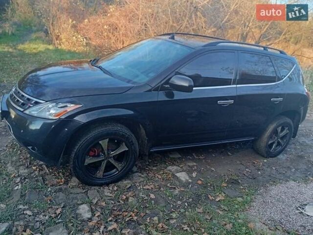 Чорний Ніссан Мурано, об'ємом двигуна 3.5 л та пробігом 301 тис. км за 4500 $, фото 1 на Automoto.ua