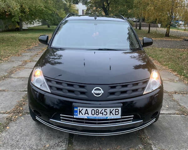 Черный Ниссан Мурано, объемом двигателя 3.5 л и пробегом 282 тыс. км за 7500 $, фото 1 на Automoto.ua