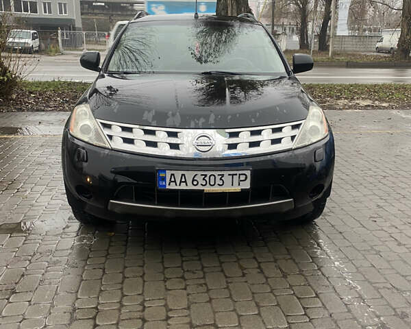 Черный Ниссан Мурано, объемом двигателя 3.5 л и пробегом 317 тыс. км за 5500 $, фото 1 на Automoto.ua