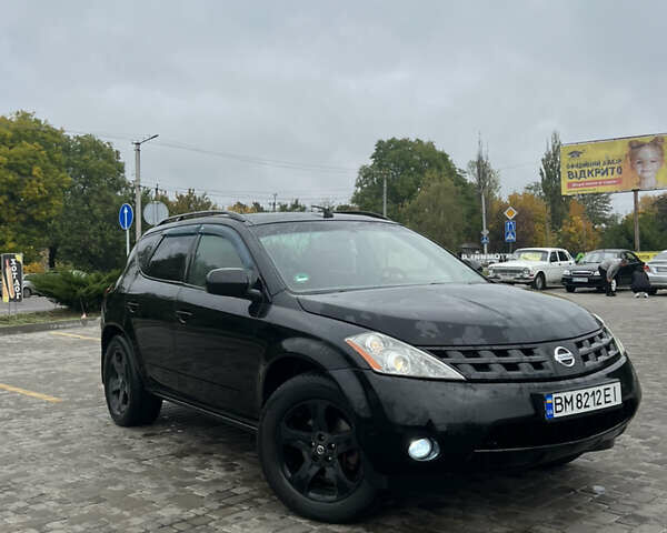 Черный Ниссан Мурано, объемом двигателя 3.5 л и пробегом 250 тыс. км за 6100 $, фото 1 на Automoto.ua