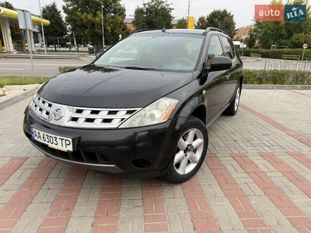 Черный Ниссан Мурано, объемом двигателя 3.5 л и пробегом 317 тыс. км за 4200 $, фото 1 на Automoto.ua