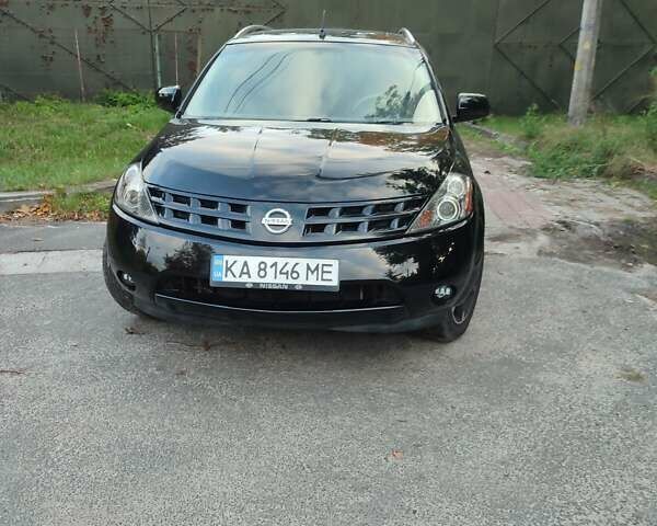 Черный Ниссан Мурано, объемом двигателя 3.5 л и пробегом 260 тыс. км за 8500 $, фото 1 на Automoto.ua