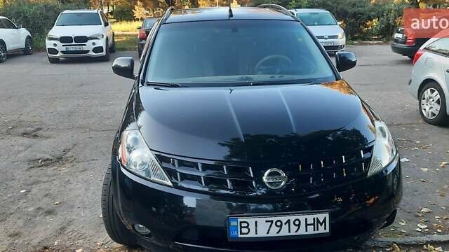 Черный Ниссан Мурано, объемом двигателя 3.5 л и пробегом 290 тыс. км за 7400 $, фото 1 на Automoto.ua
