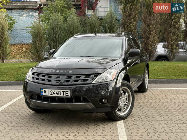 Черный Ниссан Мурано, объемом двигателя 3.5 л и пробегом 238 тыс. км за 6500 $, фото 1 на Automoto.ua