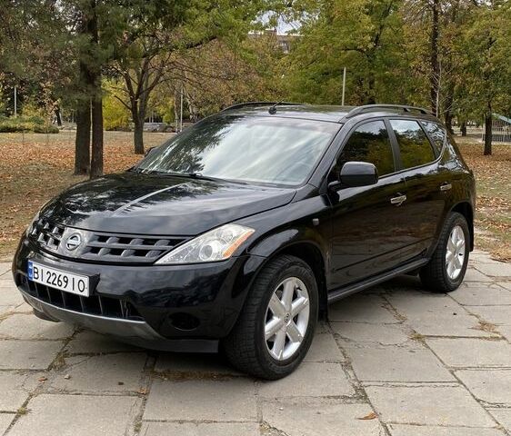 Чорний Ніссан Мурано, об'ємом двигуна 3.5 л та пробігом 259 тис. км за 4700 $, фото 1 на Automoto.ua