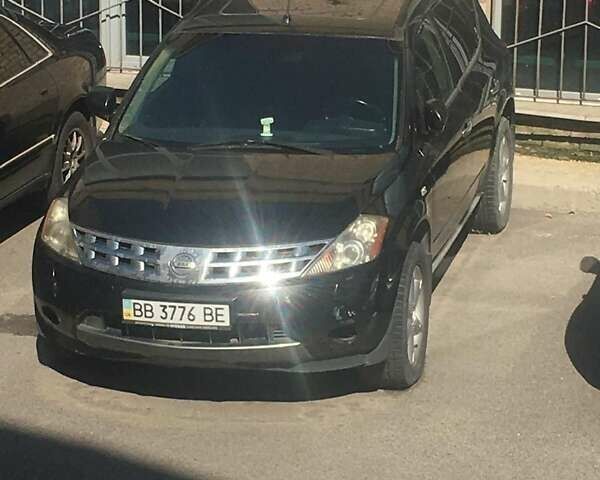 Черный Ниссан Мурано, объемом двигателя 3.5 л и пробегом 290 тыс. км за 3950 $, фото 1 на Automoto.ua