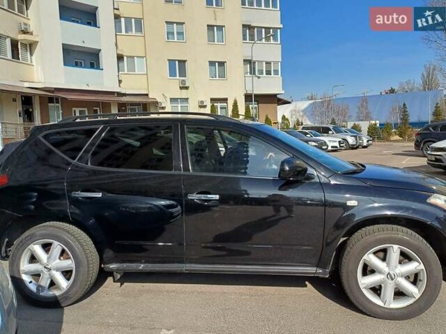 Черный Ниссан Мурано, объемом двигателя 3.5 л и пробегом 230 тыс. км за 8000 $, фото 1 на Automoto.ua