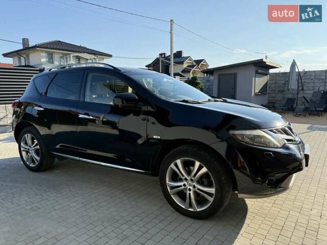 Черный Ниссан Мурано, объемом двигателя 2.49 л и пробегом 200 тыс. км за 14500 $, фото 1 на Automoto.ua