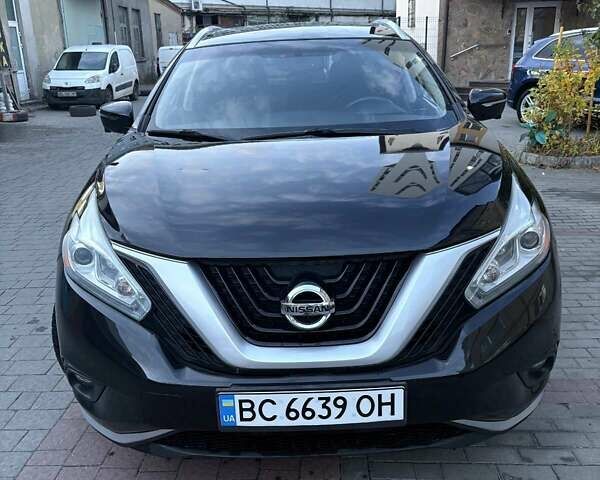 Черный Ниссан Мурано, объемом двигателя 3.5 л и пробегом 130 тыс. км за 16200 $, фото 1 на Automoto.ua