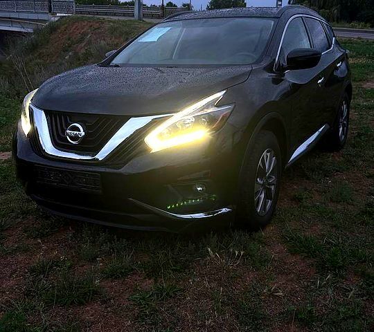 Черный Ниссан Мурано, объемом двигателя 3.5 л и пробегом 77 тыс. км за 17000 $, фото 1 на Automoto.ua