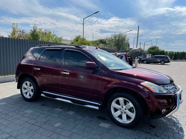 Красный Ниссан Мурано, объемом двигателя 3.5 л и пробегом 140 тыс. км за 8000 $, фото 1 на Automoto.ua